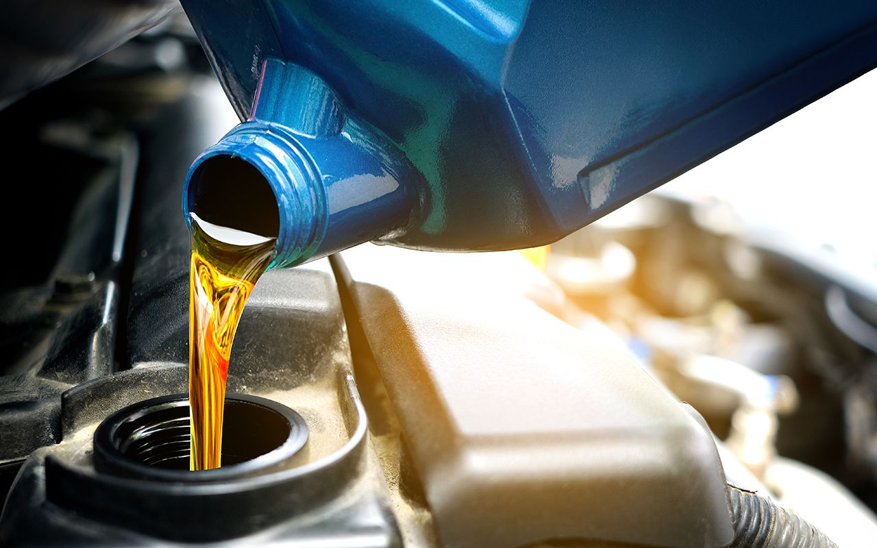 ASE Certified mechanic performing Oil & Filter Changes